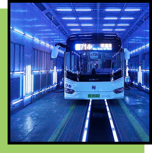 A bus is parked in the middle of a tunnel.