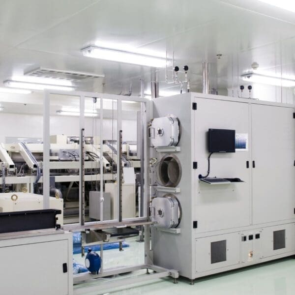 A machine in a clean room with many machines.