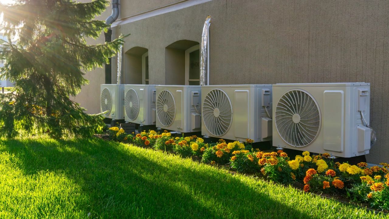 Exterior AC units with flowers